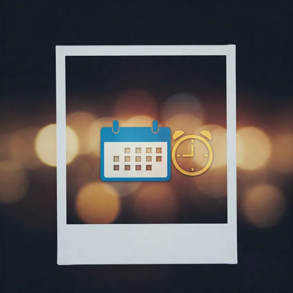 Abstract image of a calendar icon overlaid on a photo.