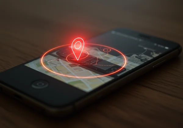 Smartphone photo with a location pin indicating a privacy risk.